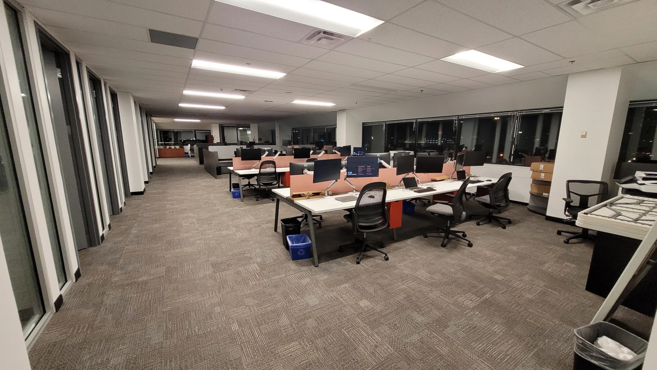 Professional janitorial cleaning cart in a modern office at night, showing after-hours office cleaning in North York without disrupting business operations