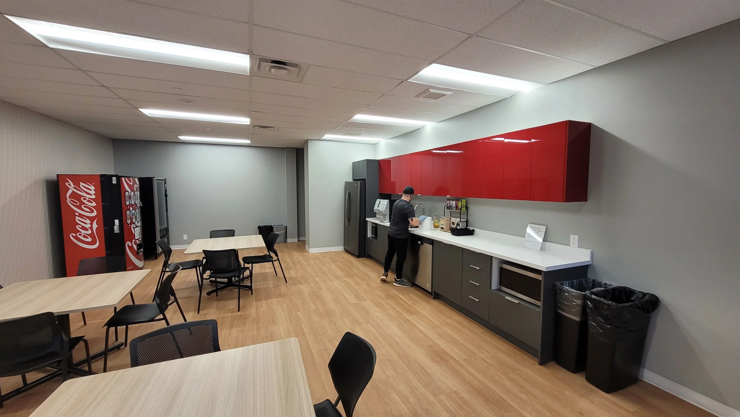 Cleaning a staff breakroom and kitchen area in an office