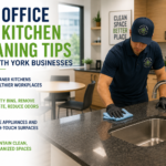 Office kitchen cleaning North York business breakroom with a cleaner wiping countertops and shared surfaces