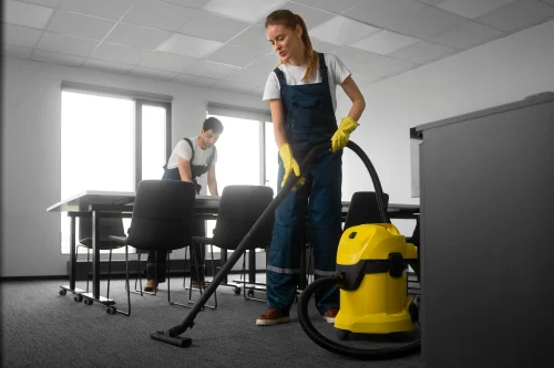 Cleaning staff deep cleaning a home in Toronto with professional equipment.